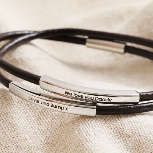 Close Up of Personalisation on Men's Personalised Double Wrap Thin Leather Bracelet in Brown on Beige Fabric