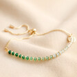 Adjustable Green Ombre Stone Bracelet in Gold on Beige Fabric