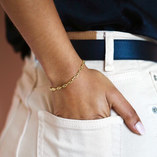 Bracelet on Model Anchor Chain Bracelet in Gold on model with hand in pocket