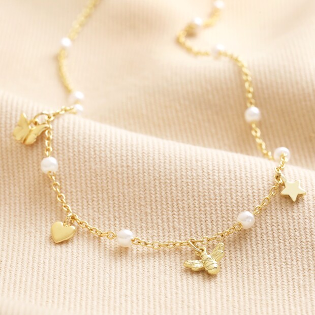 Bee, Pearl, Butterfly and Heart Charm Necklace in Gold Bee, Pearl, Butterfly and Heart Charm Necklace in Gold