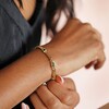 Model Putting Green Baguette Crystal Chain Bracelet in Gold on 