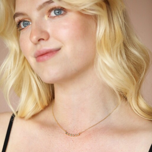 Model Wearing Ombre Crystal Star Bar Necklace in Blue