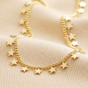 Tiny Star Charm Necklace in Gold