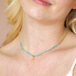Throat Chakra Beaded Necklace in Gold on model with blonde hair