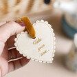 Close up of model holding Afternoon Tea Wicker Gift Hamper Heart Shaped Token