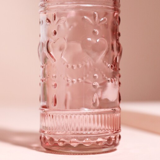 Close up of raised detailing on Pink Glass Bottle Vase