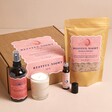 Restful Night Gift Set with Products Outside of Packaging with Pale Pink Background
