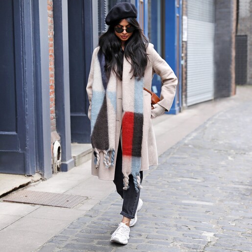 Model walking down street wearing Abstract Patterned Winter Scarf