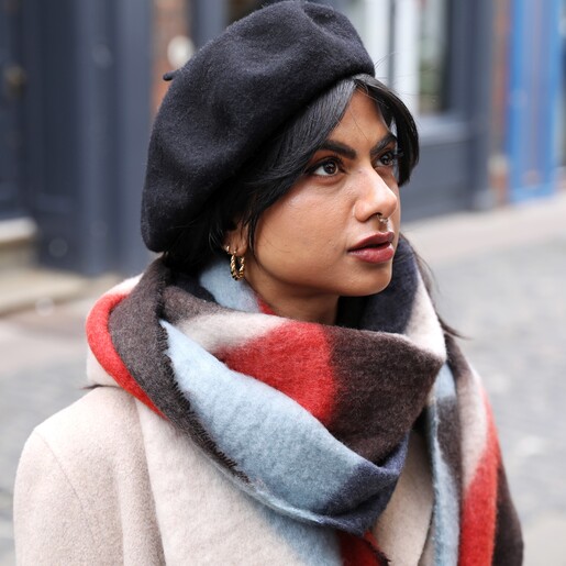 Model looking up wearing Abstract Patterned Winter Scarf