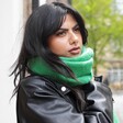 Model wearing Emerald Green Winter Scarf wrapped up in leather jacket