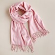 Personalised Birth Flower Pink Winter Scarf arranged on neutral coloured background
