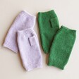Lilac Hand Warmers with Green Version on Beige Surface