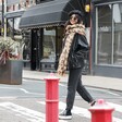 Model walking down street wearing Leopard Print Winter Scarf