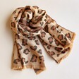 Leopard Print Winter Scarf against neutral coloured background