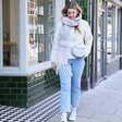 Light Pink and Grey Striped Winter Scarf on model walking down street