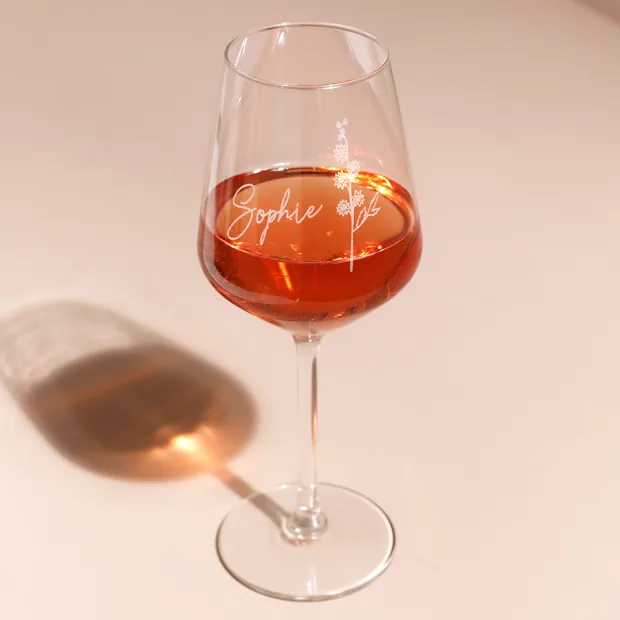 Personalised Birth Flower Wine Glass Personalised Birth Flower Wine Glass half full of rose