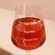 Close up of Personalised Measure Wine Glass full of rose
