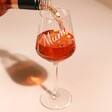 Rose wine pouring into the Personalised Wine Glass with Name