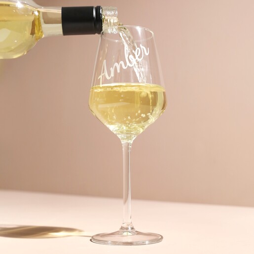 White wine pouring into the Personalised Wine Glass with Name