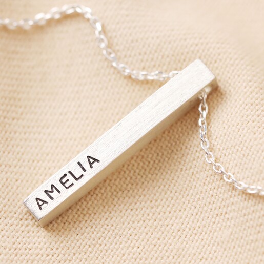 Personalised Sterling Silver Bar Necklace Personalised Sterling Silver Bar Necklace on top of beige coloured fabric