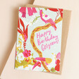 Ohh Deer Gorgeous Tropical Birds Birthday Card on Beige Surface