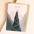 Ohh Deer New Home Mountain Greetings Card Laying on Top of Envelope on Pink Surface