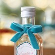 Close up of top of bottle showing velvet bow on 40ml Santa's Tipple Christmas Spiced Gin