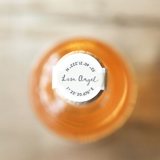 top of 100ml Tastes Like Christmas Spiced Gin on top of wooden counter