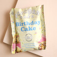 Birthday Cake Popcorn Snack Pack on pink surface