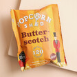 Butterscotch Popcorn Snack Pack on plain surface