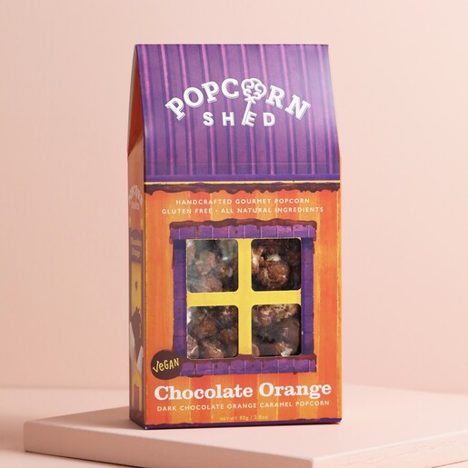 Popcorn Shed Chocolate Orange Gourmet Popcorn against neutral coloured background
