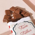 Chocolate from From Father Christmas Milk Chocolate Bar cut up out of bar