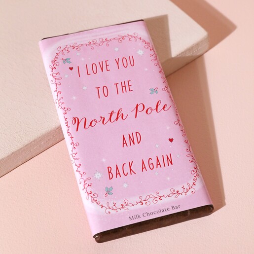 Love You To The North Pole Milk Chocolate Bar against neutral background