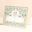 Rifle Paper Co. Always and Forever Swan Greetings Card on top of beige coloured background