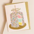 Rifle Paper Co. Layer Cake Birthday Card on Envelope on Beige Surface