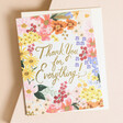 Rifle Paper Co. Margaux Thank You Greetings Card Laying on top of Envelope on Beige Surface