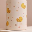 Close up of the bumblebee and flower print on the Sass & Belle Children's Bee Metal Water Bottle