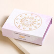 Aquarius Zodiac Gemstone Set in closed box on top of beige coloured backdrop