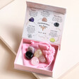 Aries Zodiac Gemstone Set open with gemstones out of cloth inside of box