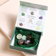 Gemstones in Libra Zodiac Gemstone Set on top of bag inside of open box