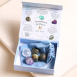 Pisces Zodiac Gemstone Set open showing gemstones on top of cloth bag