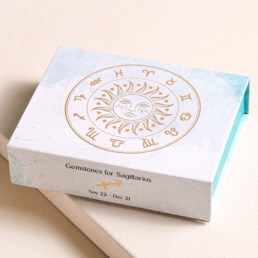Sagittarius Zodiac Gemstone Set inside of box on top of neutral coloured backdrop