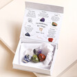 Virgo Zodiac Gemstone Set inside of gift box out of cloth bag on top of beige coloured backdrop