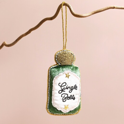 Gin-gle Bells Beaded Hanging Decoration Hanging Against Beige Surface