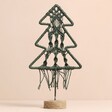 Green Woven Rope Tree Ornament on Beige Background