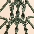 Close Up of Rope Knots on Green Woven Rope Tree Ornament