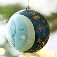 Hand-Painted Winter Moon Bauble close up in Christmas tree