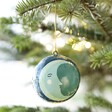 Hand-Painted Winter Moon Bauble hanging from Christmas tree 