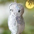Close up of Owl Beaded Hanging Decoration hanging from Christmas tree 