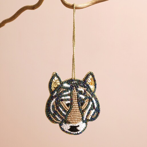 Tiger Beaded Hanging Decoration Hanging Against Beige Surface